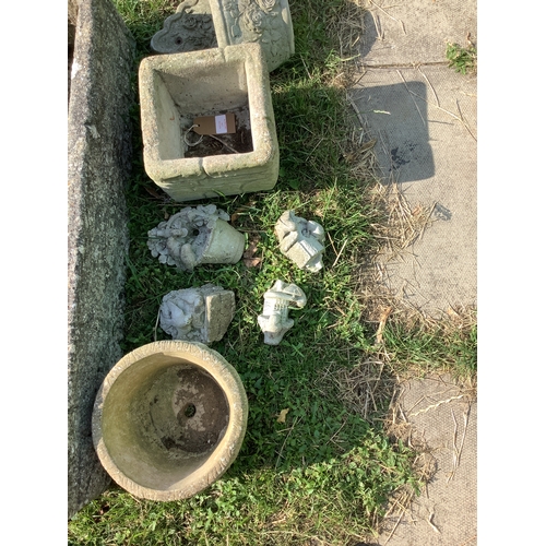 279 - A square pot, circular pot and four ornaments
