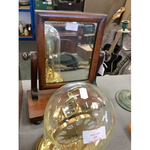 332 - A walnut small swing mirror