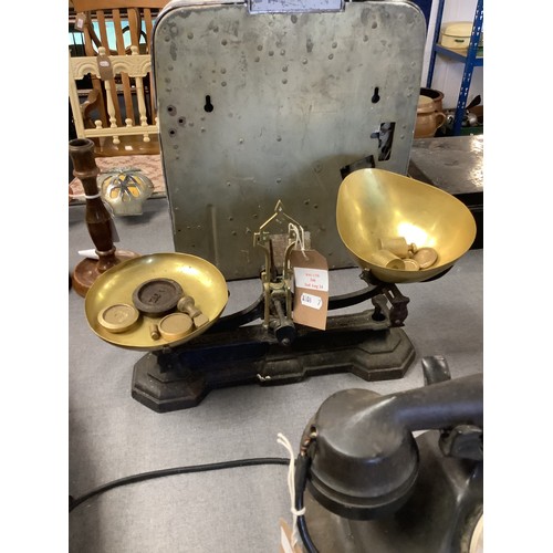 346 - A set of vintage cast iron and brass scales with assorted weights