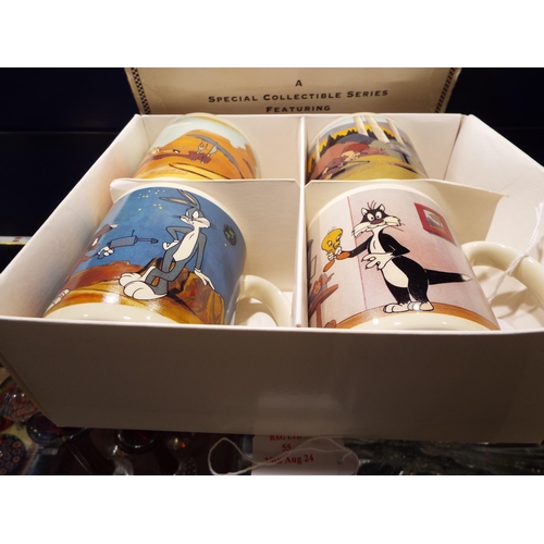 55 - A boxed set of Warner Brothers 'The Looney Tunes' Cel Series II collector's mugs