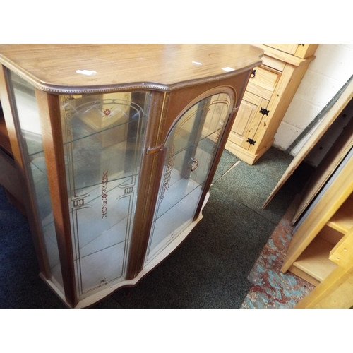 486 - A 1950's/60's glass display cabinet with gilt painted panels and two glass shelves