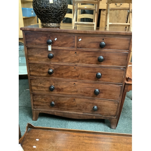 496 - A flamed mahogany chest of two short and four long graduating drawers