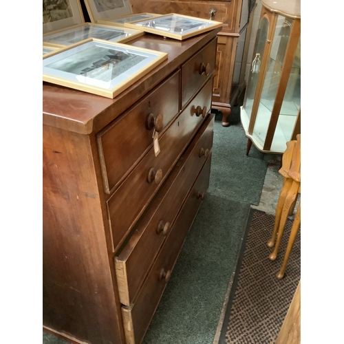 497 - A Victorian mahogany chest of two short over three long graduating drawers