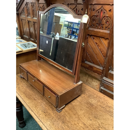 500 - A mahogany cross banded swing dressing mirror with three short drawers A/F