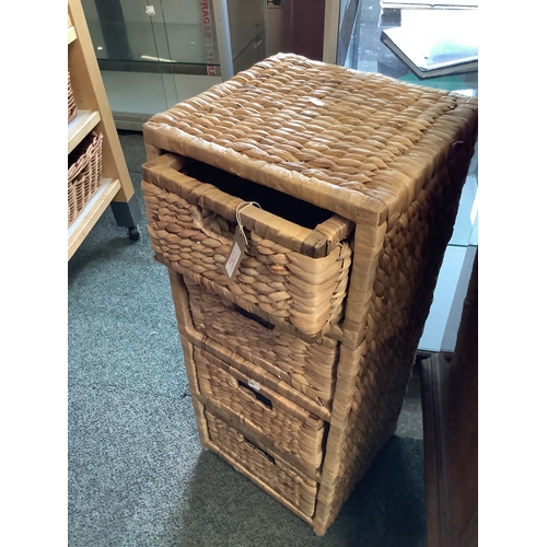502 - A rattan four drawer side unit