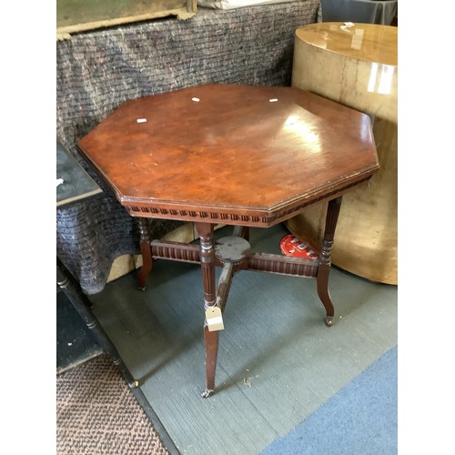 514 - A mahogany octagonal table with X frame stretcher