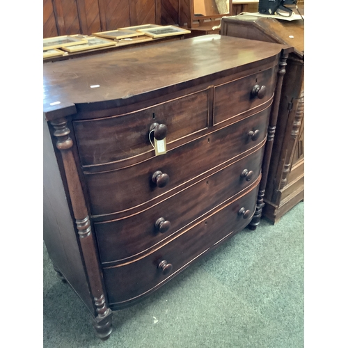 534 - A Victorian mahogany bow front chest of two short drawers over three long graduating drawers flanked... 
