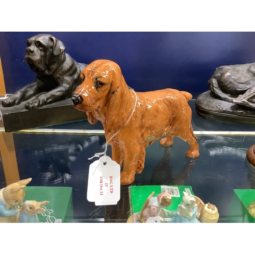 23 - A Royal Doulton Spaniel figurine HN 1187