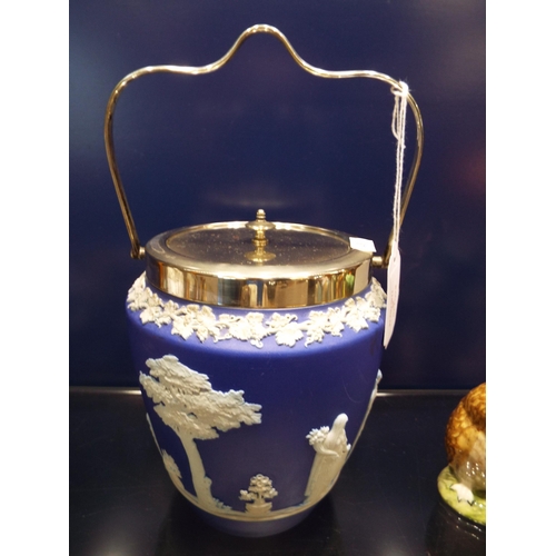 85 - A Wedgwood dark blue biscuit barrel