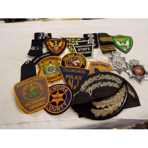 202 - A selection of police badges and insignia