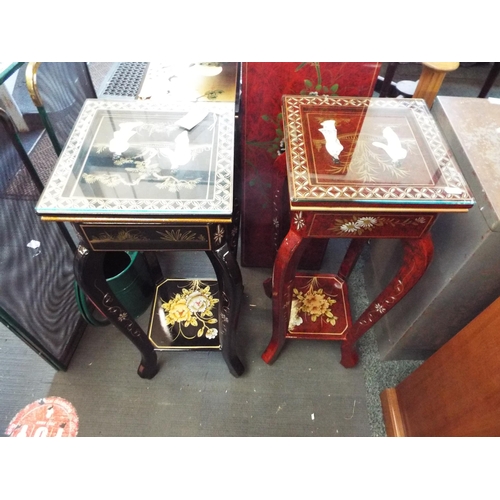 549 - A black and red Chinese lacquered pair of jardinière stands with mother of pearl and gilt decoration