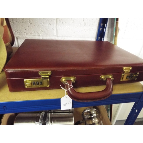 300 - A vintage leather Amiet burgundy attaché case