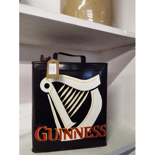 318 - A vintage fuel can with hand-painted Guinness decoration