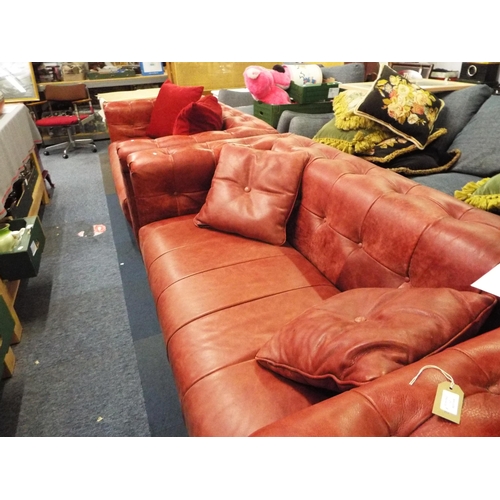 371 - Two red leather Chesterfield sofas