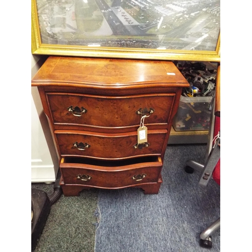396 - A reproduction burr walnut effect three drawer chest