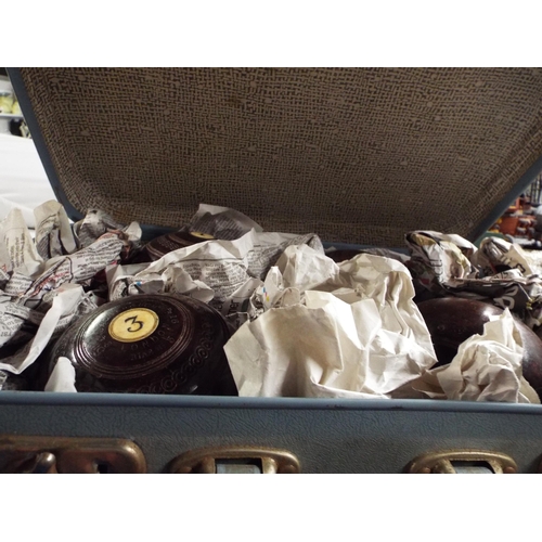 401 - A set of four vintage wooden Jaques & Son London lawn bowls