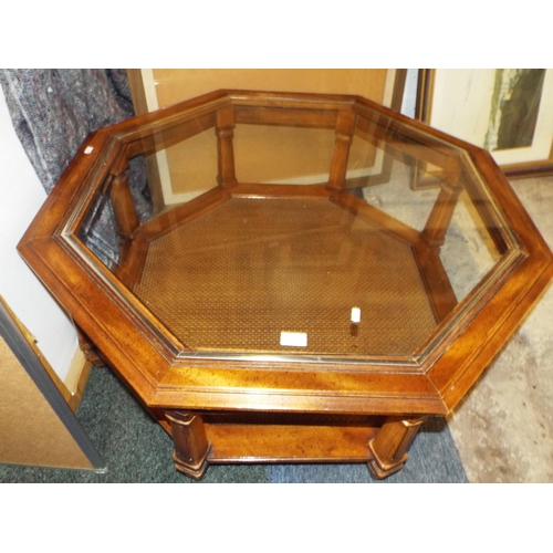405 - An Octagonal glass top coffee table