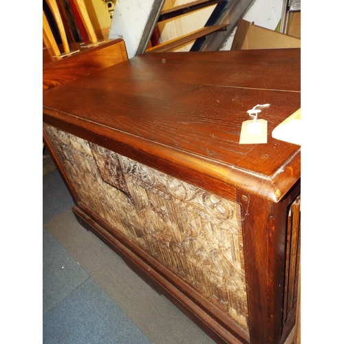 408 - A carved lined fold blanket chest
