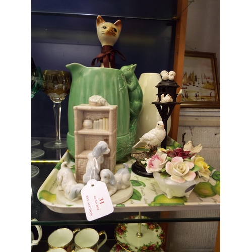 31 - A mixed selection of assorted china to include a Sylvac green acorn and squirrel water jug, a Royal ... 