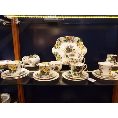 40 - A Staffordshire 'Elizabethan' part tea set comprising of cups, saucers, sandwich plate, cake, plate,... 