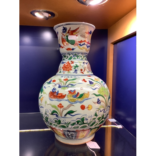 1 - A large Chinese vase having Mandarin duck, floral and dragon decoration signed to front