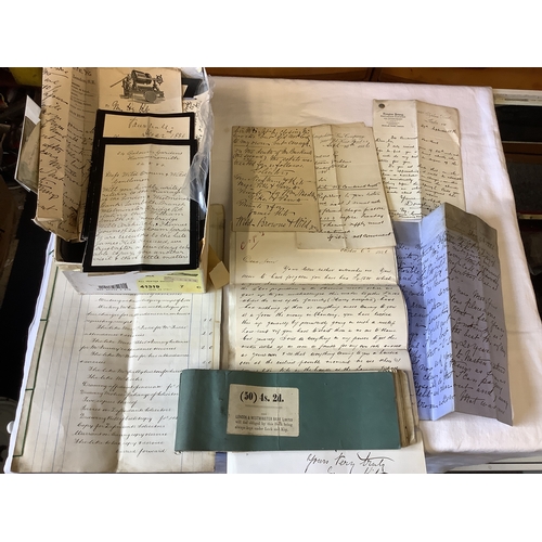 61 - A box of assorted papers and postcards to include court papers dated 1886