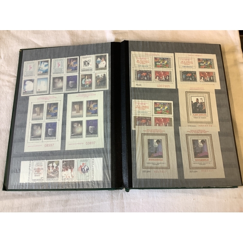 74 - An album housing a quantity of stamps to include Monaco, Isle Of Man, Nigeria, Saint Lucia etc mint