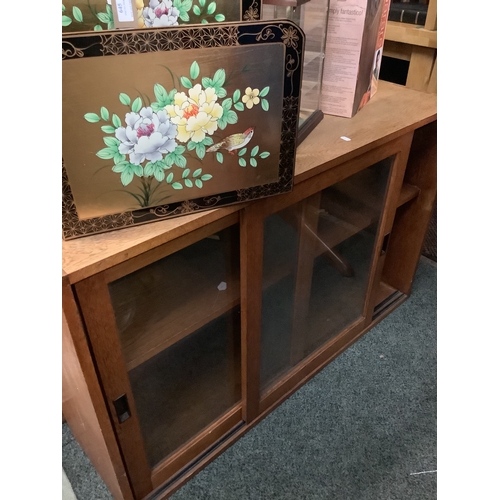 646 - A vintage hanging oak and glass door cabinet