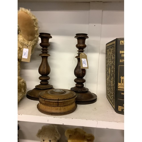 525 - A pair of oak candlesticks and lidded pot with signed metal work York Minster Bell Metal