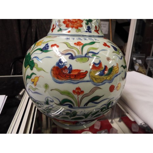 1 - A large Chinese vase having Mandarin duck, floral and dragon decoration signed to front