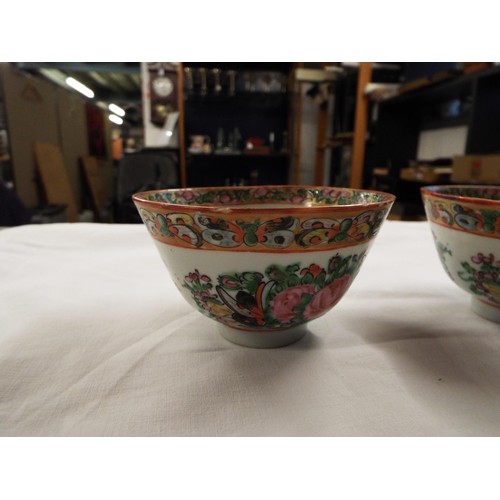 50 - A pair of Chinese famille rose bowls, a large blue and red floral decorated Chinese bowl A/F togethe... 