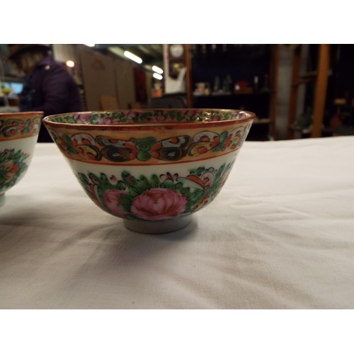 50 - A pair of Chinese famille rose bowls, a large blue and red floral decorated Chinese bowl A/F togethe... 