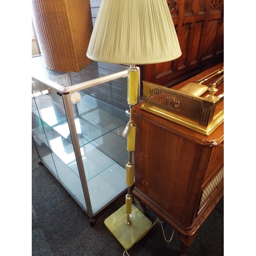 657 - A green marble effect and metal floor standing lamp with shade