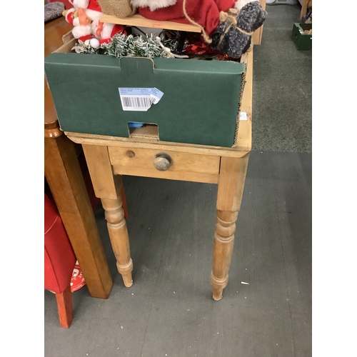 702 - A vintage pine side table with drawer