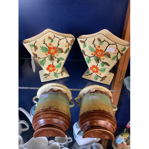 74 - A pair of Phoenix fan shaped vase and a pair of Devon wall pockets