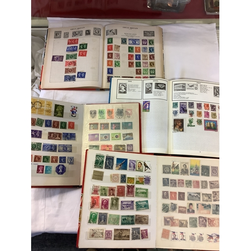 81 - Four vintage albums of stamps of the world