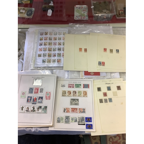 92 - A selection of loose leaves with assorted stamps of Europe