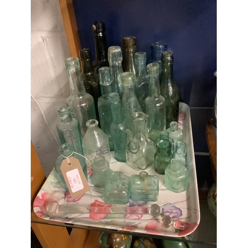 101 - A mixed selection of vintage glass bottles to include Whitbread & Co, R Fry & Co, Bransons Ltd, Bens... 