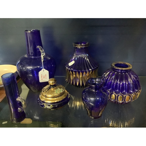 112 - A selection of Bristol blue glass to include three vases, lidded pot, ewer etc