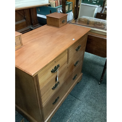 538 - A teak dressing table having two jewellery drawers above two short over two long drawers