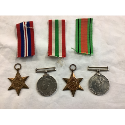 119 - An Italy Star, 1939-45 Star, Defence Medal and General Service Medal