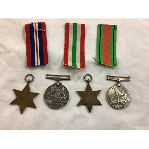 119 - An Italy Star, 1939-45 Star, Defence Medal and General Service Medal