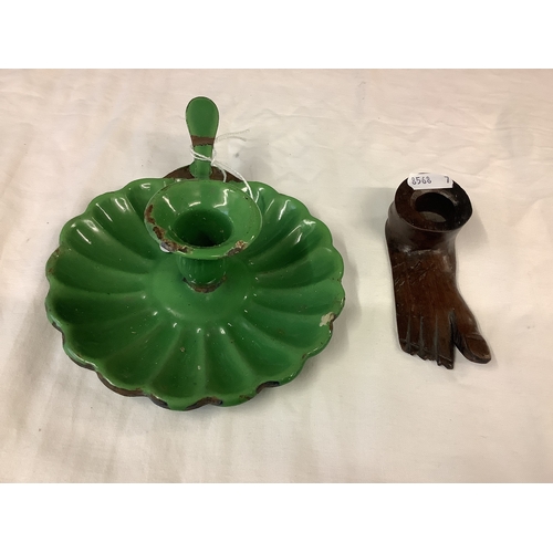 144 - A green enamel chamberstick together with a carved wooden foot candle holder