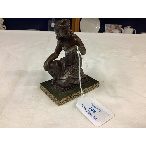 146 - A bronze figurine of a seated lady