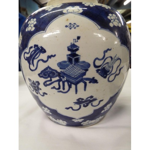 8 - A Chinese tea-pot with dragon decoration (chip to lid)