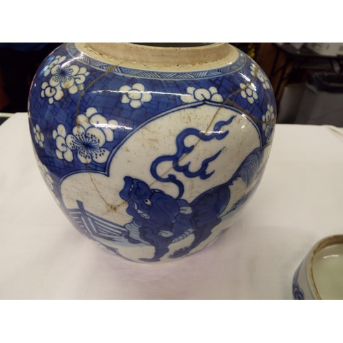 8 - A Chinese tea-pot with dragon decoration (chip to lid)