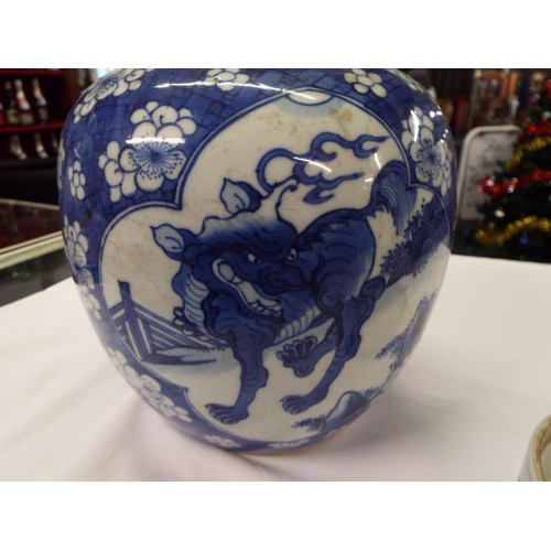 8 - A Chinese tea-pot with dragon decoration (chip to lid)