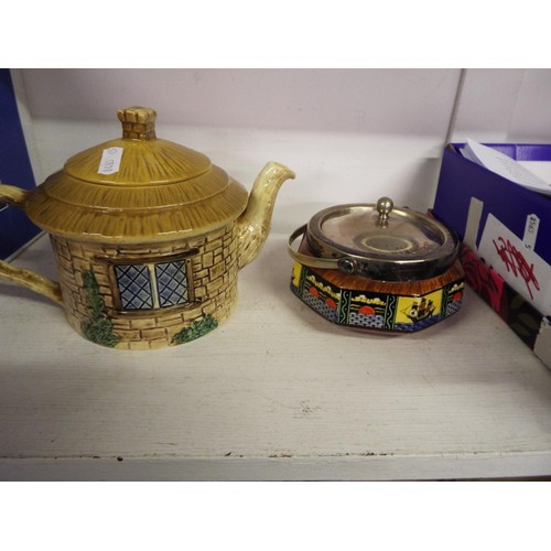 408 - A mixed selection to include biscuit barrels, tea pot and tobacco jar