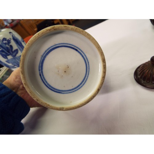 26 - Two Chinese Kangxi blue and white tea caddies having pictorial decoration resting on hardwood stands