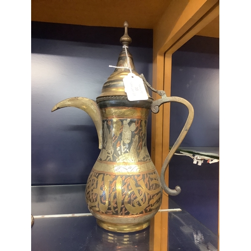 33 - An antique Dallah copper and silver brass Indian Egyptian coffee pot